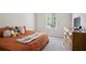 Cozy bedroom with carpet flooring, natural lighting, and a double-door closet at 4133 Shoals Ln, Union City, GA 30291