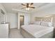 Spacious main bedroom showcasing a tray ceiling, neutral color palette, and ample closet space at 4133 Shoals Ln, Union City, GA 30291
