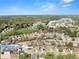 Stunning aerial view of a neighborhood with mature trees, pond, and easy highway access at 847 Edgeley Ln, Lawrenceville, GA 30044