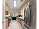 Modern kitchen with stainless steel appliances and granite countertops at 847 Edgeley Ln, Lawrenceville, GA 30044