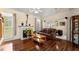 Cozy living room with fireplace, hardwood floors, and abundant natural light at 847 Edgeley Ln, Lawrenceville, GA 30044