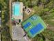 Overhead view of community amenities: pool, playground, and tennis/basketball courts at 261 Silver Ridge Dr, Dallas, GA 30157