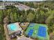 Aerial shot of neighborhood amenities including pool, playground, tennis and basketball courts at 261 Silver Ridge Dr, Dallas, GA 30157