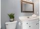 Bathroom featuring vanity with mirror and a decorative plant at 261 Silver Ridge Dr, Dallas, GA 30157