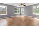 Versatile living room features tile flooring, neutral paint and natural light at 261 Silver Ridge Dr, Dallas, GA 30157