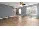 Bright living room with tile flooring, ceiling fan and ample natural light at 261 Silver Ridge Dr, Dallas, GA 30157