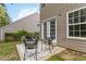 Cozy patio area with seating, perfect for enjoying outdoor moments at 261 Silver Ridge Dr, Dallas, GA 30157