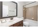 Functional bathroom featuring a single vanity and sink, tiled shower, and bathtub combination at 325 Valley Brook Way, Atlanta, GA 30342