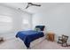 Bedroom with a blue bed and rocking chair at 325 Valley Brook Way, Atlanta, GA 30342