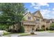 Charming two-story home with well-maintained landscaping, showcasing a blend of traditional and modern design at 325 Valley Brook Way, Atlanta, GA 30342