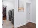 Convenient laundry room with modern washer and dryer units, adjacent to a well-organized closet at 325 Valley Brook Way, Atlanta, GA 30342
