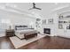 Spacious main bedroom with hardwood floors, fireplace, and sitting area at 325 Valley Brook Way, Atlanta, GA 30342
