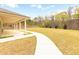 Walkway leading to covered patio and spacious backyard area at 4824 Sultana Sw Way, Atlanta, GA 30331