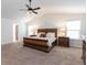 Main bedroom with comfortable furniture, neutral carpeting and an ensuite bathroom at 4824 Sultana Sw Way, Atlanta, GA 30331