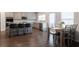Spacious kitchen with a center island, stainless steel appliances, and a dining area, perfect for Gathering meals at 4824 Sultana Sw Way, Atlanta, GA 30331