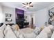 Comfortable living room featuring a modern fireplace and stylish decor, perfect for relaxing and entertaining at 4824 Sultana Sw Way, Atlanta, GA 30331