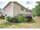 View of the backyard with a lawn and a lush garden at 537 Rendezvous Rd, Acworth, GA 30102