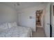Bedroom featuring neutral walls, neutral carpet, a light filled window with curtains and hall access at 537 Rendezvous Rd, Acworth, GA 30102