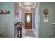 Inviting foyer featuring tile flooring and a decorative front door at 537 Rendezvous Rd, Acworth, GA 30102