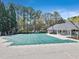 A large, covered community pool offers residents a refreshing place to swim and relax at 8450 Sundial Ct, Johns Creek, GA 30024