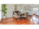 Spacious dining room with hardwood floors and traditional-style furniture and furnishings at 8450 Sundial Ct, Johns Creek, GA 30024