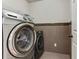 Well-organized laundry room with modern washer and dryer set at 8450 Sundial Ct, Johns Creek, GA 30024