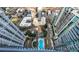 Breathtaking aerial view showcasing the buildings, swimming pool, and city landscape at 195 14Th Ne St # Ph206, Atlanta, GA 30309