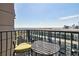 Private balcony featuring city views and metal bistro seating at 195 14Th Ne St # Ph206, Atlanta, GA 30309