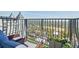 Cozy balcony seating area with decorative metal railing overlooking the cityscape at 195 14Th Ne St # Ph206, Atlanta, GA 30309