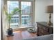 Bright bedroom featuring a plant and a window with an outdoor view at 195 14Th Ne St # Ph206, Atlanta, GA 30309