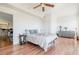 Bright bedroom featuring hardwood floors, ceiling fan and neutral walls at 195 14Th Ne St # Ph206, Atlanta, GA 30309