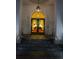 Building's entryway featuring golden doors leading to an interior with an ornate hanging lamp at 195 14Th Ne St # Ph206, Atlanta, GA 30309