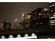 Nighttime shot of city buildings, showing the skyline lights and architecture at 195 14Th Ne St # Ph206, Atlanta, GA 30309