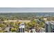 Scenic city view from a high-rise building, featuring trees and architecture at 195 14Th Ne St # Ph206, Atlanta, GA 30309