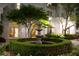 Courtyard featuring manicured landscaping, stone fountain and residential building at 195 14Th Ne St # Ph206, Atlanta, GA 30309