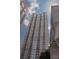 Tall condominium building with numerous balconies at 195 14Th Ne St # Ph206, Atlanta, GA 30309