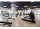 Bright fitness center featuring treadmills, weight machines and ample workout space at 195 14Th Ne St # Ph206, Atlanta, GA 30309
