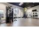 Modern gym with plenty of weight machines, open floor space, and natural light at 195 14Th Ne St # Ph206, Atlanta, GA 30309