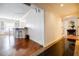 Hallway leading into living space with breakfast bar, features elegant dark floors at 195 14Th Ne St # Ph206, Atlanta, GA 30309