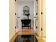 Elegant hallway with marble floors, a decorative mirror, and glass doors, creating a welcoming entrance at 195 14Th Ne St # Ph206, Atlanta, GA 30309