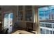 Bright kitchen featuring granite countertops, stainless steel appliances, and city views at 195 14Th Ne St # Ph206, Atlanta, GA 30309