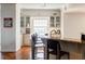Kitchen area with breakfast bar and seating, adjacent to view window at 195 14Th Ne St # Ph206, Atlanta, GA 30309