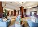 Expansive lobby area with comfortable seating, elegant columns, and marble flooring at 195 14Th Ne St # Ph206, Atlanta, GA 30309