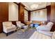 Inviting lobby featuring stylish seating, a glass coffee table, and classic wood trim at 195 14Th Ne St # Ph206, Atlanta, GA 30309