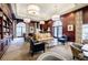 Elegant lounge showcases bookshelves, ample seating, hardwood trim, and a welcoming atmosphere at 195 14Th Ne St # Ph206, Atlanta, GA 30309