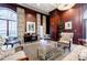 Inviting lounge showcasing a desk, several chairs, natural lighting from windows, and hardwood decor at 195 14Th Ne St # Ph206, Atlanta, GA 30309