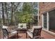 Balcony featuring an outdoor seating arrangement and metal railings at 1674 Executive Park Ne Ln, Atlanta, GA 30329