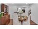Bright dining room featuring a wooden table with seating for four and an antique wooden china cabinet at 1674 Executive Park Ne Ln, Atlanta, GA 30329