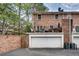Exterior view of home with garage, balcony, and brick facade at 1674 Executive Park Ne Ln, Atlanta, GA 30329