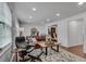 Inviting living room showcasing a leather sofa set and an open layout with views of the dining room at 1674 Executive Park Ne Ln, Atlanta, GA 30329